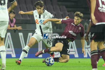 2024-10-29 - Matteo Francesconi of Cesena FC competes for the ball with Franco Tongya of US Salernitana 1922 during the Soccer BKT between US Salernitana 1919 vs Cesena FC at Arechi Stadium - US SALERNITANA VS CESENA FC - ITALIAN SERIE B - SOCCER