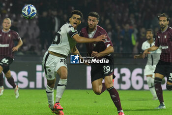 2024-10-29 - Elayis Tavsan of Cesena FC competes for the ball with Paolo Ghiglione of US Salernitana 1938 during the Soccer BKT between US Salernitana 1919 vs Cesena FC at Arechi Stadium - US SALERNITANA VS CESENA FC - ITALIAN SERIE B - SOCCER