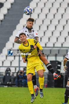 02/11/2024 - Przemyslaw Wisniewski (Spezia) against Fabio Abuso (Modena) - SPEZIA CALCIO VS MODENA FC - SERIE B - CALCIO