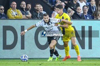 02/11/2024 - Arkadiusz Reca (Spezia) against Alessandro Di Pardo (Modena) - SPEZIA CALCIO VS MODENA FC - SERIE B - CALCIO