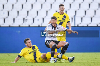 02/11/2024 - Diego Falcinelli (Spezia) is fouled by Giovanni Zaro (Modena) - SPEZIA CALCIO VS MODENA FC - SERIE B - CALCIO