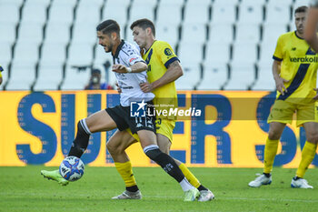 02/11/2024 - Diego Falcinelli (Spezia) against Alessandro Dellavalle (Modena) - SPEZIA CALCIO VS MODENA FC - SERIE B - CALCIO