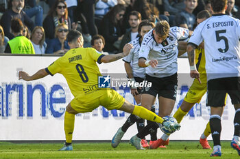 02/11/2024 - Francesco Pio Esposito (Spezia) against Simone Santoro (Modena) - SPEZIA CALCIO VS MODENA FC - SERIE B - CALCIO