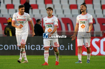 02/11/2024 - Mario Sampirisi of AC Reggiana, Tobias Reinhart of AC Reggiana and Andrea Meroni of AC Reggiana the disappointed - SSC BARI VS AC REGGIANA - SERIE B - CALCIO