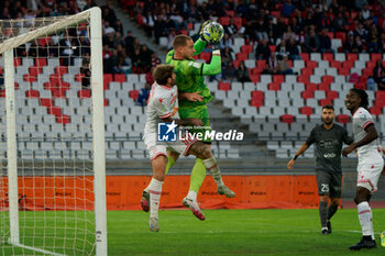 02/11/2024 - Boris Radunovic of SSC Bari in action against Manolo Portanova of AC Reggiana - SSC BARI VS AC REGGIANA - SERIE B - CALCIO