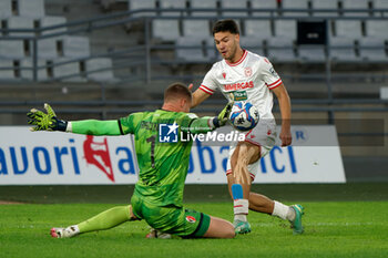 02/11/2024 - Antonio Vergara of AC Reggiana in action against Boris Radunovic of SSC Bari - SSC BARI VS AC REGGIANA - SERIE B - CALCIO