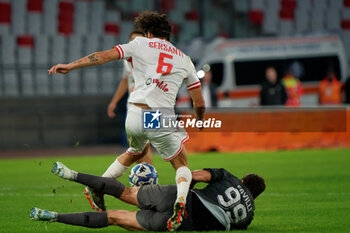 02/11/2024 - Alessandro Sersani of AC Reggiana in action against Andrea Favilli of SSC Bari - SSC BARI VS AC REGGIANA - SERIE B - CALCIO