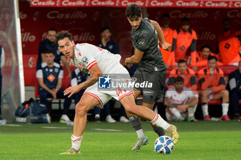 02/11/2024 - Lorenzo Lucchesi of AC Reggiana in action against Nunzio Lella of SSC Bari - SSC BARI VS AC REGGIANA - SERIE B - CALCIO