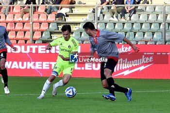 03/11/2024 - Matteo Tramoni (Pisa) thwarted by Luca Ravanelli (Cremonese) - US CREMONESE VS AC PISA - SERIE B - CALCIO