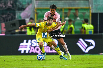 03/11/2024 - Francesco D'Alessio (A.S. Cittadella 1973) in action against Pietro Ceccaroni (Palermo F.C.) during the Italian Serie BKT match between Palermo F.C. vs A.S. Cittadella 1973 on 3rd November 2024 at the Renzo Barbera stadium in Palermo, Italy - PALERMO FC VS AS CITTADELLA - SERIE B - CALCIO