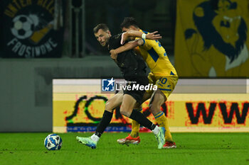 08/11/2024 - Jeremy Le Douaron (Palermo F.C.) in action against Ilario Monterisi (Frosinone Calcio) during the Italian Serie BKT match between Frosinone Calcio vs. Palermo F.C. on 8th November 2024 at the Benito Stirpe stadium in Frosinone, Italy - FROSINONE CALCIO VS PALERMO FC - SERIE B - CALCIO