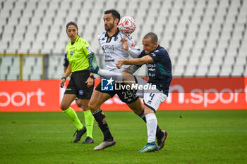 2024-11-24 - Tommaso Arrigoni (Sudtirol) fights for the ball against Francesco Cassata (Spezia) - SPEZIA CALCIO VS FC SüDTIROL - ITALIAN SERIE B - SOCCER