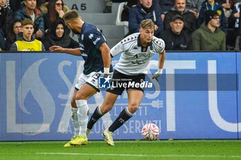 2024-11-24 - Francesco Pio Esposito (Spezia) fights for the ball against Salvatore Andrea Molina (Sudtirol) - SPEZIA CALCIO VS FC SüDTIROL - ITALIAN SERIE B - SOCCER