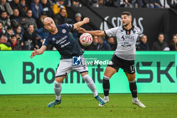 2024-11-24 - Antonio-Mirko Colak (Spezia) fights for the ball against Andrea Masiello (Sudtirol) - SPEZIA CALCIO VS FC SüDTIROL - ITALIAN SERIE B - SOCCER