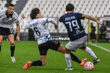 2024-11-24 - Salvatore Andrea Molina (Sudtirol) fights for the ball against Duccio Degli Innocenti (Spezia) - SPEZIA CALCIO VS FC SüDTIROL - ITALIAN SERIE B - SOCCER