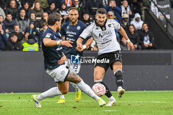 2024-11-24 - Antonio-Mirko Colak (Spezia) fights for the ball against Mateusz Jakub Praszelik (Sudtirol) - SPEZIA CALCIO VS FC SüDTIROL - ITALIAN SERIE B - SOCCER