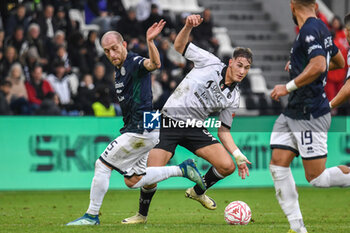 2024-11-24 - Andrea Masiello (Sudtirol) fights for the ball against Francesco Pio Esposito (Spezia) - SPEZIA CALCIO VS FC SüDTIROL - ITALIAN SERIE B - SOCCER