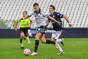 2024-11-24 - Arkadiusz Reca (Spezia) hampered by Salvatore Andrea Molina (Sudtirol) - SPEZIA CALCIO VS FC SüDTIROL - ITALIAN SERIE B - SOCCER