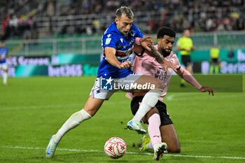 2024-11-24 - Clash between Antonino La Gumina (U.C. Sampdoria) and Rayyan Baniya (Palermo F.C.) during the Italian Serie BKT match between Palermo F.C. vs U.C. Sampdoria on 24th November 2024 at the Renzo Barbera stadium in Palermo, Italy - PALERMO FC VS UC SAMPDORIA - ITALIAN SERIE B - SOCCER