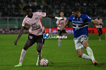 2024-11-24 - Stredair Owusu Appuah (Palermo F.C.) in action against Nicholas Ioannou (U.C. Sampdoria) during the Italian Serie BKT match between Palermo F.C. vs U.C. Sampdoria on 24th November 2024 at the Renzo Barbera stadium in Palermo, Italy - PALERMO FC VS UC SAMPDORIA - ITALIAN SERIE B - SOCCER