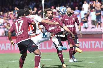 2024-09-29 - Filippo Pittarello of US Catanzaro competes for the ball with Gian Marco Ferrari of US Salernitana 1919 during the Serie b bkt betwee US Salernitana 1919 vs US Catanzaro at Arechi Stadium - US SALERNITANA VS US CATANZARO - ITALIAN SERIE B - SOCCER