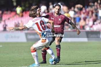 2024-09-29 - Ernesto Torregrossa of US Salernitana 1919 competes for the ball with Jacopo Petriccione of US Catanzaro during the Serie b bkt betwee US Salernitana 1919 vs US Catanzaro at Arechi Stadium - US SALERNITANA VS US CATANZARO - ITALIAN SERIE B - SOCCER