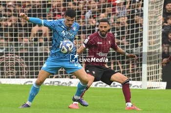 2024-10-19 - Giuseppe Di Serio of Spezia Calcio competes for the ball with Roberto Soriano of US Salernitana 1933 during the Soccer BKT between US Salernitana 1919 vs Spezia Calcio at Arechi Stadium - US SALERNITANA VS SPEZIA CALCIO - ITALIAN SERIE B - SOCCER