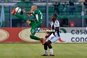 2024-09-14 - Simone Calvano of Monopoli in action against Daouda Peeters of Juventus Next Gen - MONOPOLI VS JUVENTUS NEXT GEN - ITALIAN SERIE C - SOCCER