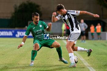 2024-09-14 - Nicolo Cudrig of Juventus Next Gen in action against Francesco Grandolfo of Monopoli - MONOPOLI VS JUVENTUS NEXT GEN - ITALIAN SERIE C - SOCCER