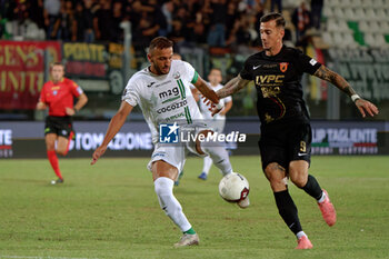 2024-09-26 - Orlando Viteritti of Monopoli in action against Jacopo Manconi of Benevento - MONOPOLI VS BENEVENTO - ITALIAN SERIE C - SOCCER