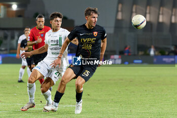 2024-09-26 - Angelo Viscardi of Benevento in action against Emanuele Scipioni of Monopoli - MONOPOLI VS BENEVENTO - ITALIAN SERIE C - SOCCER