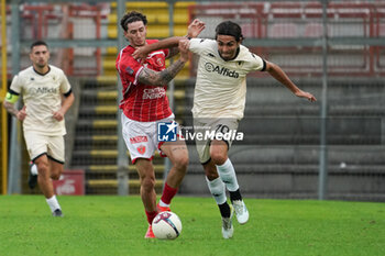 2024-10-06 - edoardo saporiti (n.70 lucchese 1905) v andrea cisco (n.17 perugia calcio) - PERUGIA VS LUCCHESE - ITALIAN SERIE C - SOCCER