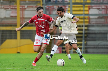 2024-10-06 - edoardo saporiti (n.70 lucchese 1905) v andrea cisco (n.17 perugia calcio) - PERUGIA VS LUCCHESE - ITALIAN SERIE C - SOCCER