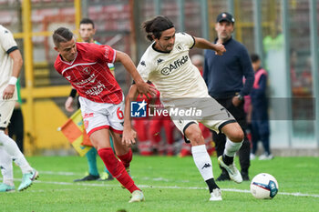 2024-10-06 - edoardo saporiti (n.70 lucchese 1905) v giovanni giunti (n.6 perugia calcio) - PERUGIA VS LUCCHESE - ITALIAN SERIE C - SOCCER