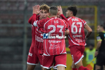 2024-11-22 - luca di maggio (n.18 perugia calcio) rejoices 1-0 whit francesco lisi (n.23 perugia calcio) - PERUGIA VS AREZZO - ITALIAN SERIE C - SOCCER