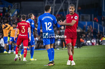 2024-01-16 - Mason Greenwood (L) of Getafe seen arguing with Loic Bade (R) of Sevilla during the football match valid for the round of 16 of the Copa del Rey tournament between Getafe and Sevilla played at Estadio Coliseum in Getafe, Spain. - GETAFE VS SEVILLA - SPANISH CUP - SOCCER