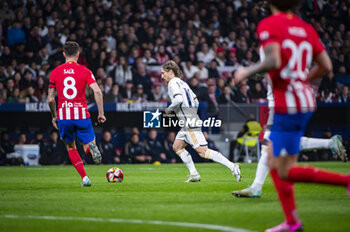 2024-01-18 - Luka Modric of Real Madrid seen in action with the ball during the football match valid for the round of 16 of the Copa del Rey tournament between Atletico Madrid and Real Madrid played at Estadio Metropolitano in Madrid, Spain. - ATLETICO MADRID VS REAL MADRID - SPANISH CUP - SOCCER