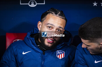 2024-01-18 - Memphis Depay of Atletico Madrid seen sitting in the bench before the football match valid for the round of 16 of the Copa del Rey tournament between Atletico Madrid and Real Madrid played at Estadio Metropolitano in Madrid, Spain. - ATLETICO MADRID VS REAL MADRID - SPANISH CUP - SOCCER