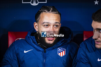 2024-01-18 - Memphis Depay of Atletico Madrid seen sitting in the bench before the football match valid for the round of 16 of the Copa del Rey tournament between Atletico Madrid and Real Madrid played at Estadio Metropolitano in Madrid, Spain. - ATLETICO MADRID VS REAL MADRID - SPANISH CUP - SOCCER