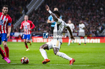 2024-01-18 - Vinicius Junior of Real Madrid seen in action with the ball during the football match valid for the round of 16 of the Copa del Rey tournament between Atletico Madrid and Real Madrid played at Estadio Metropolitano in Madrid, Spain. - ATLETICO MADRID VS REAL MADRID - SPANISH CUP - SOCCER