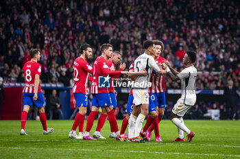 2024-01-18 - Jude Bellingham of Real Madrid seen fighting with Atletico Madrid players during the football match valid for the round of 16 of the Copa del Rey tournament between Atletico Madrid and Real Madrid played at Estadio Metropolitano in Madrid, Spain. - ATLETICO MADRID VS REAL MADRID - SPANISH CUP - SOCCER