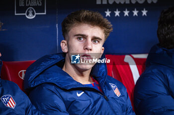 2024-01-25 - Pablo Barrios of Atletico Madrid seen sitting in the bench before the football match valid for quarter finals of the Copa del Rey tournament between Atletico Madrid and Sevilla played at Estadio Metropolitano in Madrid, Spain. - ATLETICO MADRID VS SEVILLA - SPANISH CUP - SOCCER