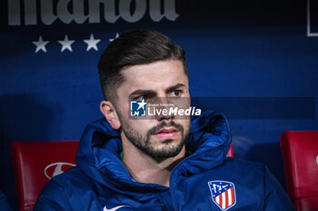 2024-01-25 - Horatiu Moldovan, new signing for Atletico Madrid, seen sitting in the bench before the football match valid for quarter finals of the Copa del Rey tournament between Atletico Madrid and Sevilla played at Estadio Metropolitano in Madrid, Spain. - ATLETICO MADRID VS SEVILLA - SPANISH CUP - SOCCER