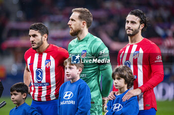 2024-01-25 - Jorge Resurreccion Merodio (Koke), Jan Oblak and Mario Hermoso of Atletico Madrid seen before the football match valid for quarter finals of the Copa del Rey tournament between Atletico Madrid and Sevilla played at Estadio Metropolitano in Madrid, Spain. - ATLETICO MADRID VS SEVILLA - SPANISH CUP - SOCCER