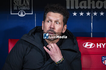 2024-01-25 - Diego Pablo Simeone, head coach of Atletico Madrid, seen sitting in the bench during the football match valid for quarter finals of the Copa del Rey tournament between Atletico Madrid and Sevilla played at Estadio Metropolitano in Madrid, Spain. - ATLETICO MADRID VS SEVILLA - SPANISH CUP - SOCCER