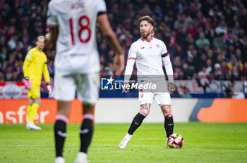 2024-01-25 - Sergio Ramos of Sevilla seen in action with the ball during the football match valid for quarter finals of the Copa del Rey tournament between Atletico Madrid and Sevilla played at Estadio Metropolitano in Madrid, Spain. - ATLETICO MADRID VS SEVILLA - SPANISH CUP - SOCCER