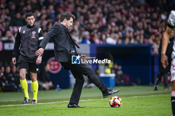2024-01-25 - Diego Pablo Simeone, head coach of Atletico Madrid, seen taking the ball during the football match valid for quarter finals of the Copa del Rey tournament between Atletico Madrid and Sevilla played at Estadio Metropolitano in Madrid, Spain. - ATLETICO MADRID VS SEVILLA - SPANISH CUP - SOCCER