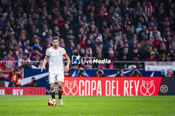 2024-01-25 - Jesus Navas of Sevilla seen in action with the ball during the football match valid for quarter finals of the Copa del Rey tournament between Atletico Madrid and Sevilla played at Estadio Metropolitano in Madrid, Spain. - ATLETICO MADRID VS SEVILLA - SPANISH CUP - SOCCER