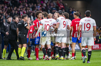 2024-01-25 - Players of both teams seen fighting during the football match valid for quarter finals of the Copa del Rey tournament between Atletico Madrid and Sevilla played at Estadio Metropolitano in Madrid, Spain. - ATLETICO MADRID VS SEVILLA - SPANISH CUP - SOCCER