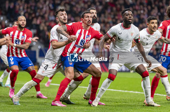 2024-02-07 - Stefan Savic of Atletico Madrid fighting for the position against Aitor Paredes and Inaki Williams of Athletic Bilbao during the football match valid for the semi-final of the Copa del Rey tournament between Atletico Madrid and Athletic Bilbao played at Estadio Metropolitano in Madrid, Spain. - ATLETICO MADRID VS ATHLETIC BILBAO - SPANISH CUP - SOCCER